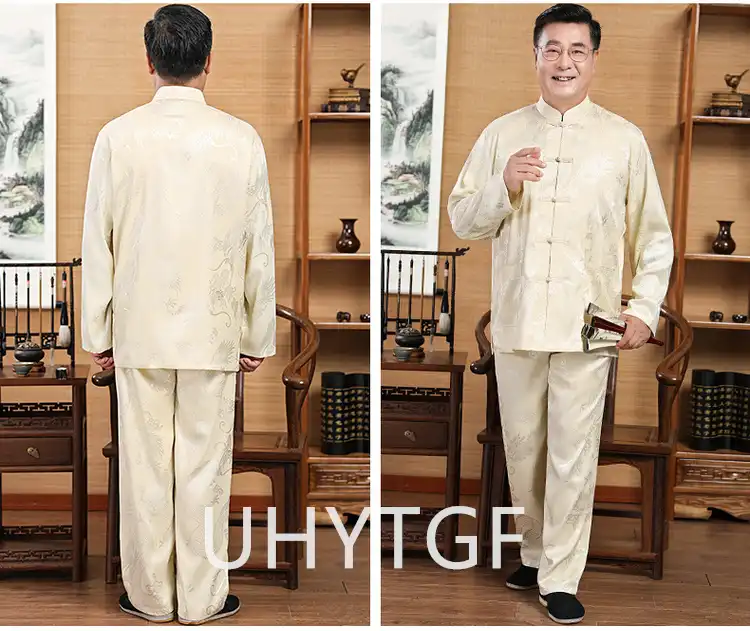 Mens black silk Tang suit set with dragon embroidery displayed on white background showing full outfit.