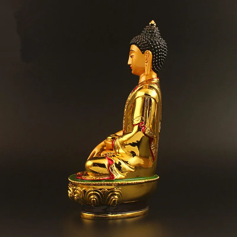 Buddha statue incense burner in use with burning incense creating meditation atmosphere at home.