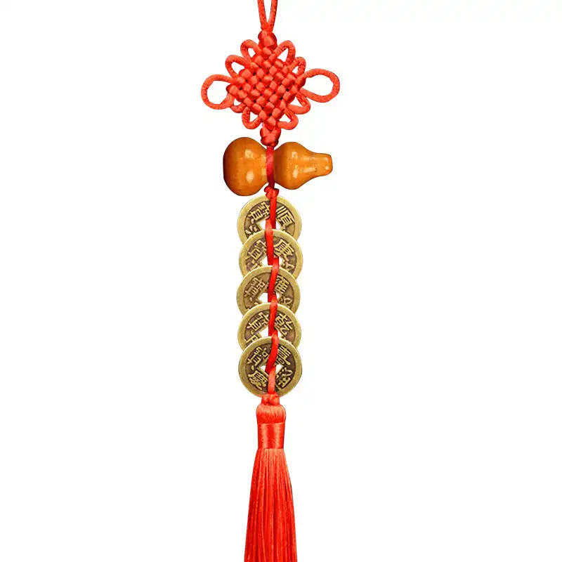 Traditional home decor feng shui pendant hanging on wall for wealth attraction and good fortune.