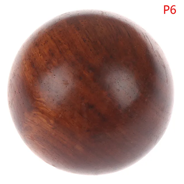 Close-up detail of natural agate stone texture and composite material quality of meditation balls.