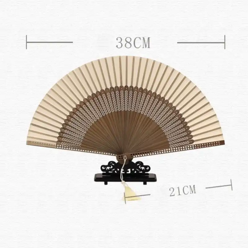 Japanese bamboo folding fan in ancient style displayed fully open showing traditional design elements.