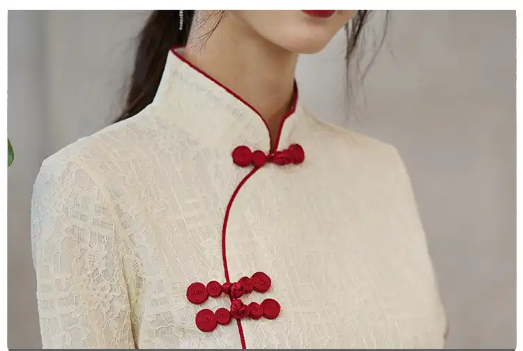 Side profile of Chinese cheongsam highlighting stand collar and vintage-inspired design.