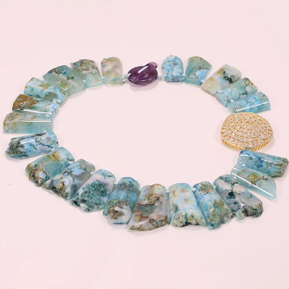 Blue agate ocean jasper necklace with CZ connector displayed on white background showing full 18 inch length.