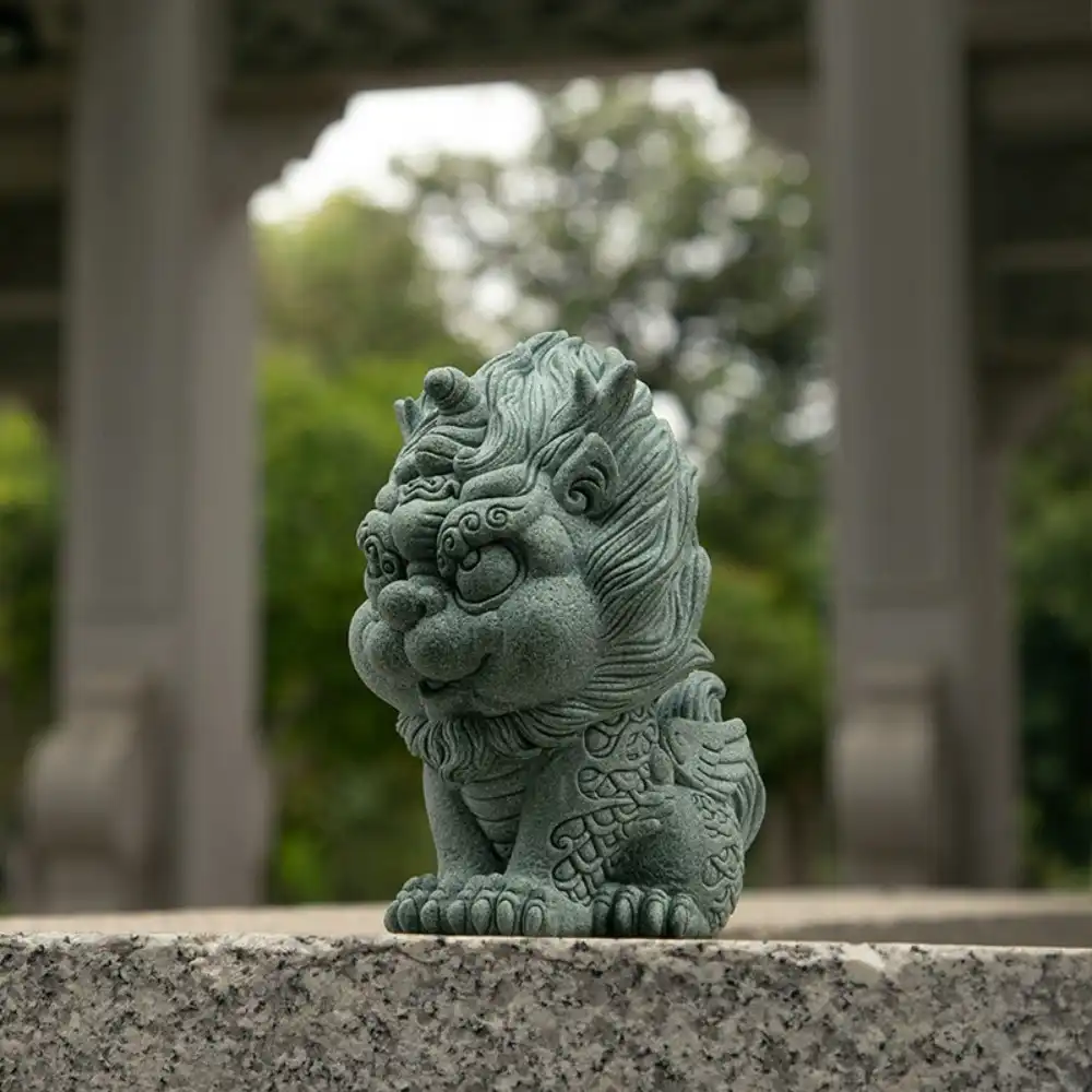 Front view of Chinese Kirin statue showcasing green sandstone material and craftsmanship.