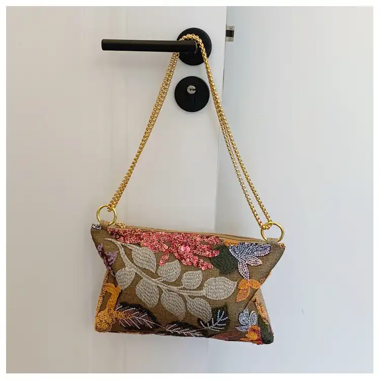 Party scene showcasing glamorous sequined clutch as perfect evening accessory for social events.