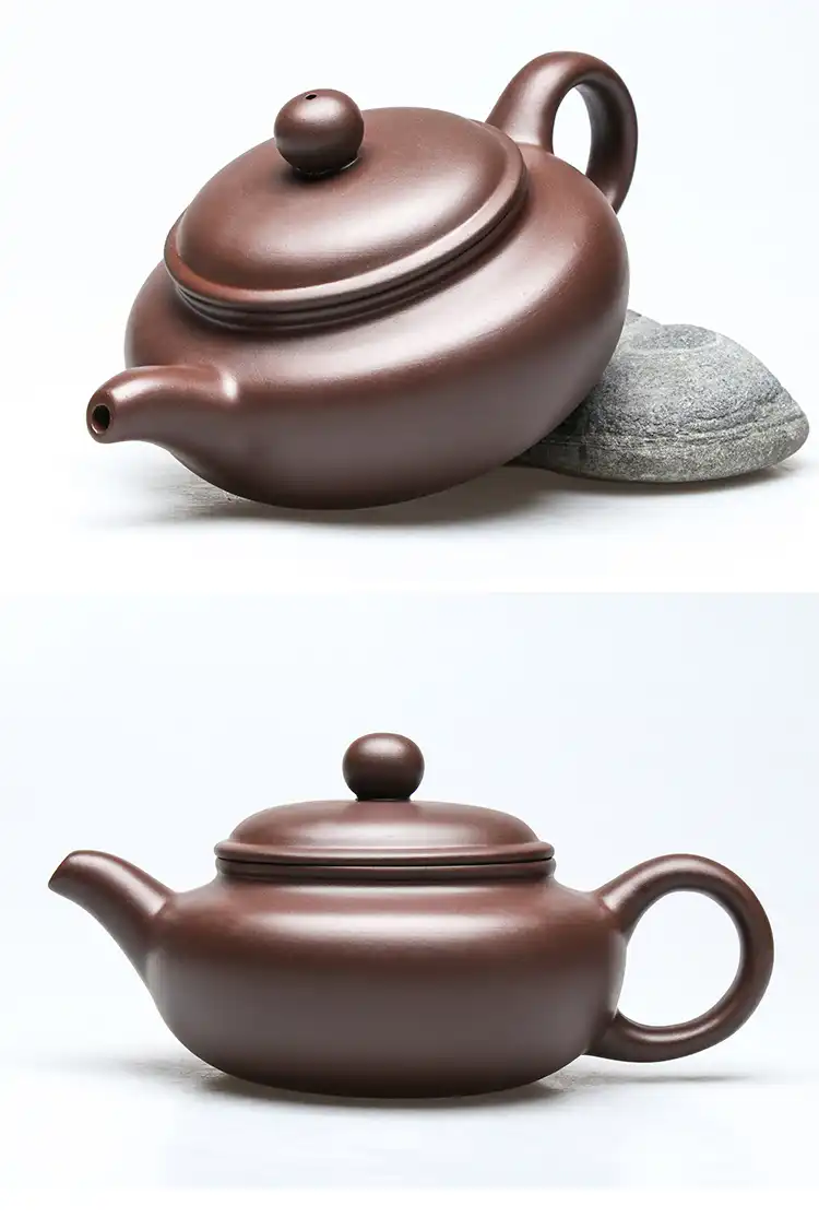 Purple clay teapot handle detail showing ergonomic design and comfortable grip for easy use.