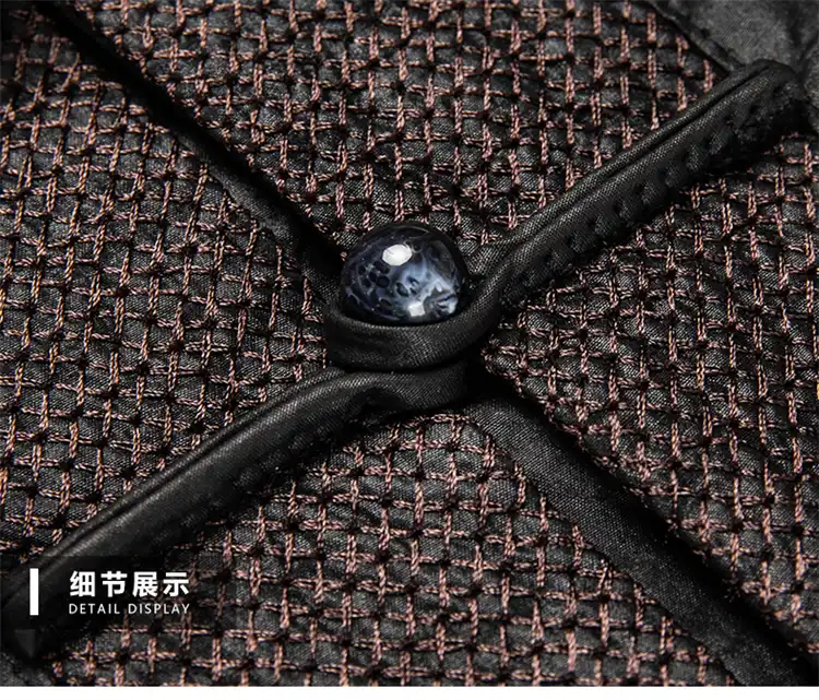 Close-up of authentic frog button closure on Gambiered silk Tang costume shirt.