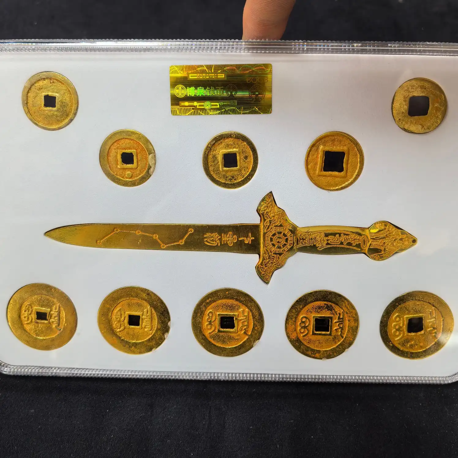 Traditional feng shui arrangement displaying seven star sword coin formation.