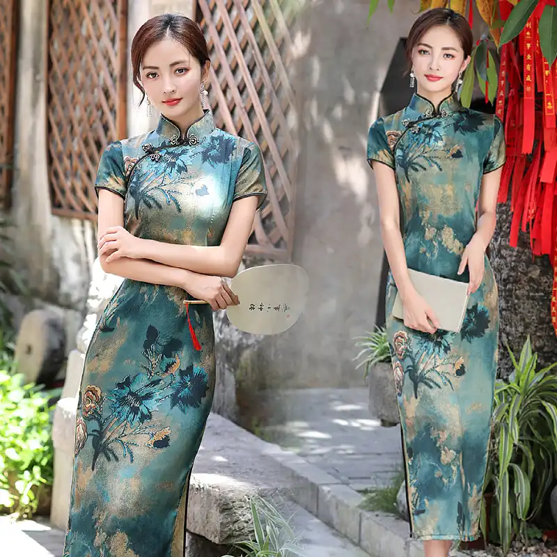 Model wearing elegant long qipao showing vintage style and slim fit silhouette design.