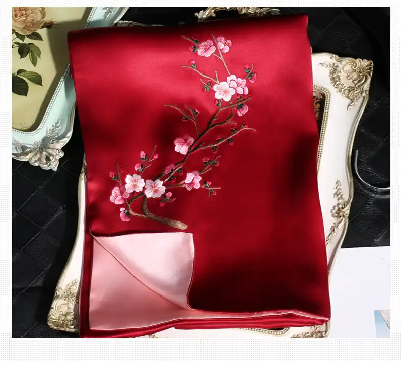 Handmade silk womens scarf featuring elegant floral patterns and premium material quality.