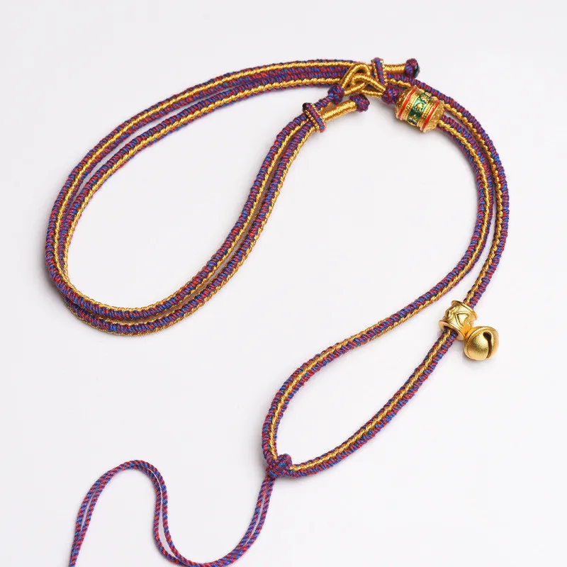Traditional handweaving process Tibetan cotton rope necklace artisan craftsmanship.
