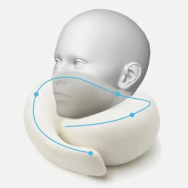 Person using travel neck pillow on airplane seat demonstrating proper positioning.