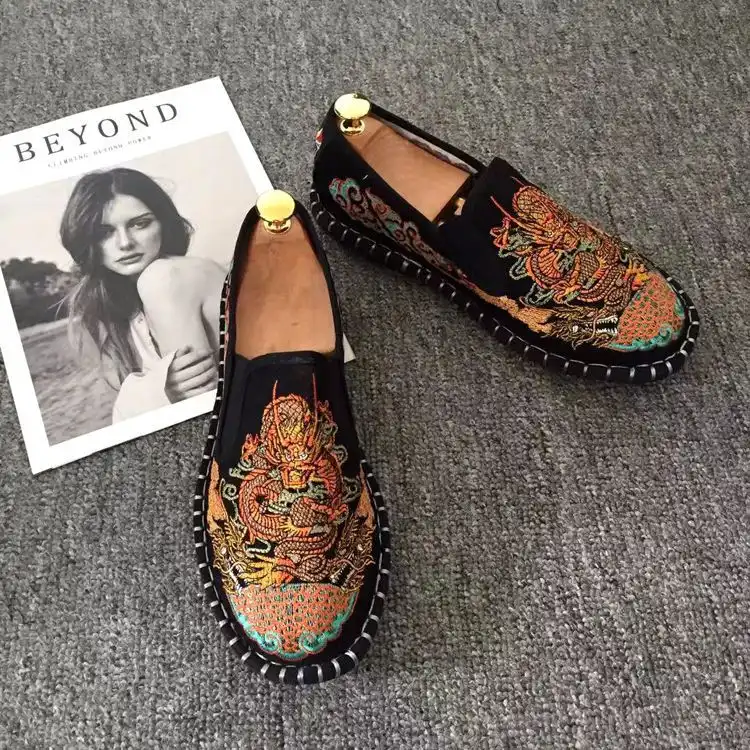 Chinese style casual shoes modeled with traditional clothing showing cultural authenticity.