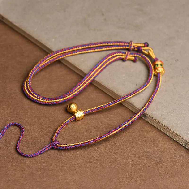 Standalone Tibetan thangka pendant rope necklace ethnic minimalist jewelry style.