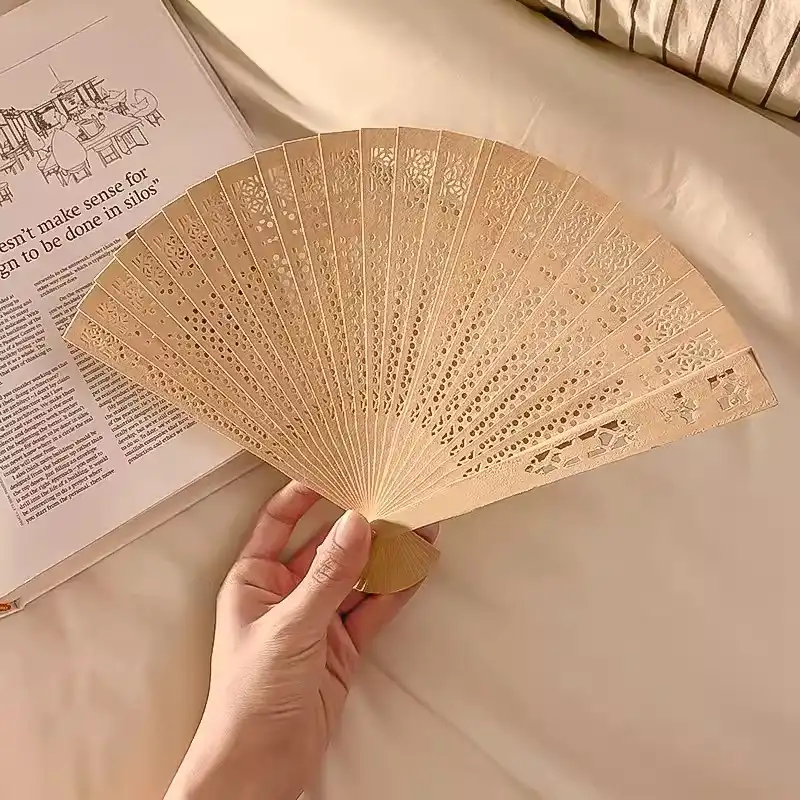 Wooden fan ribs detail showing 18-rib construction and traditional Chinese craftsmanship.