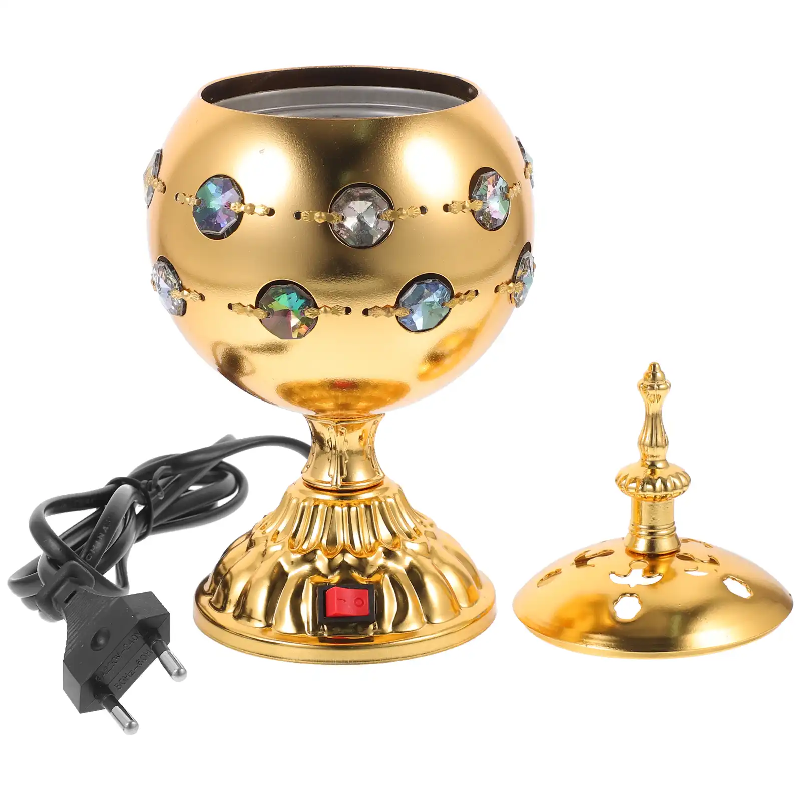 Elegant golden metal incense burner creating peaceful ambiance in yoga meditation space.