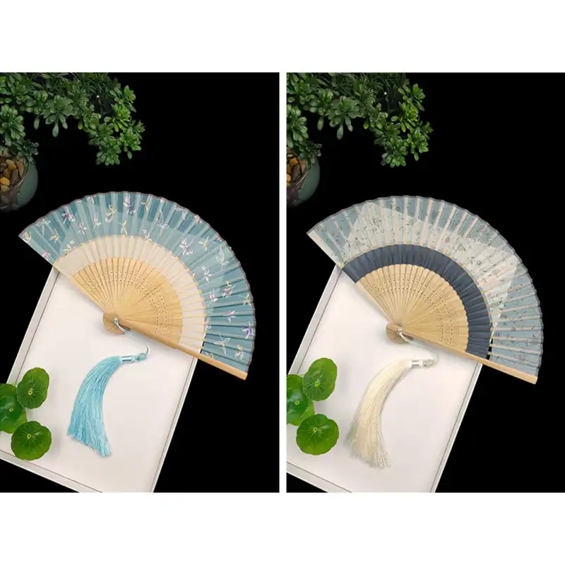 Interior design showcase displaying Japanese silk fan as wall art and decoration.