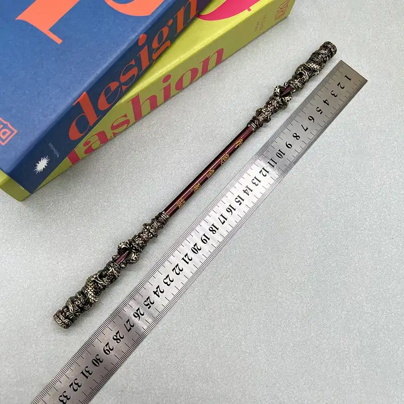 Ruyi Jingu Bang staff model end caps showing authentic game-inspired design elements