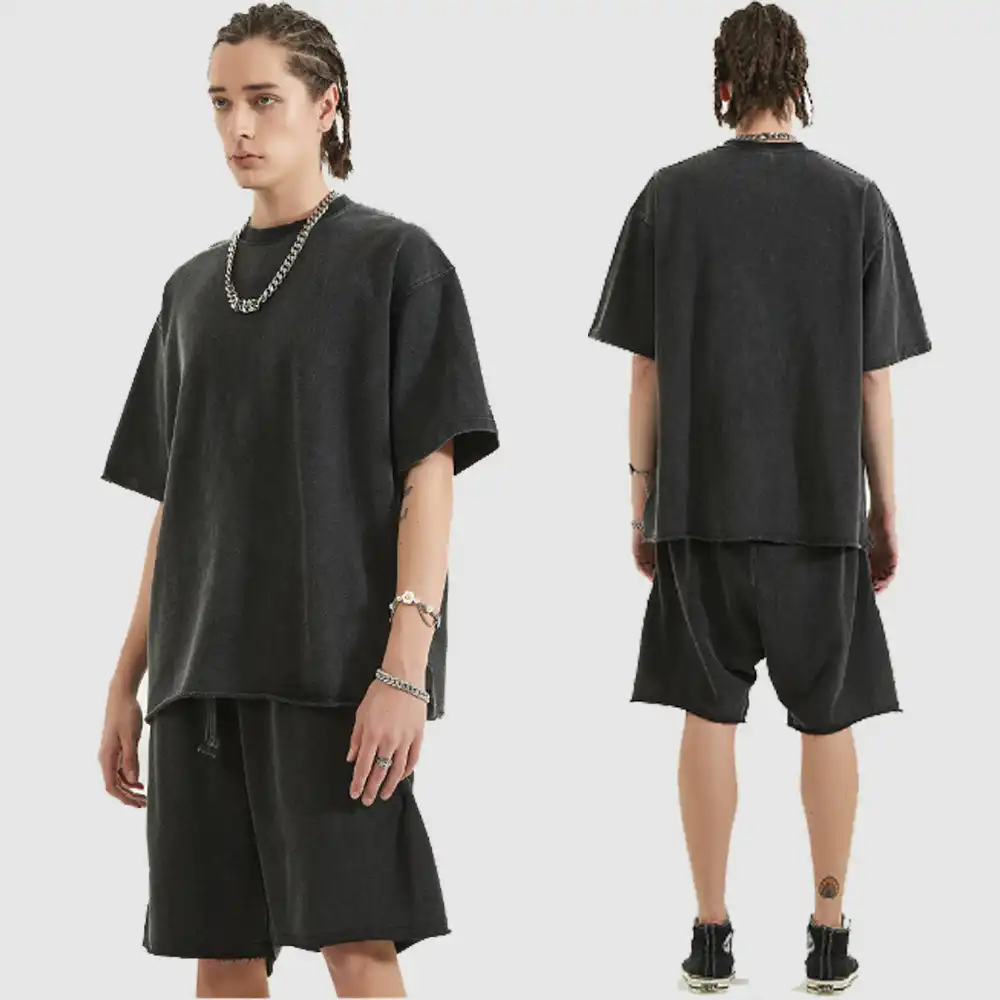 Black anime T-shirt with O-neck, worn casually by male model..