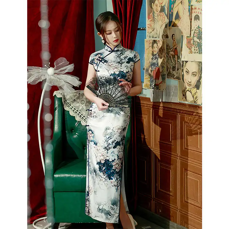 Model in cheongsam dress for cultural performance displaying traditional Chinese elegance.