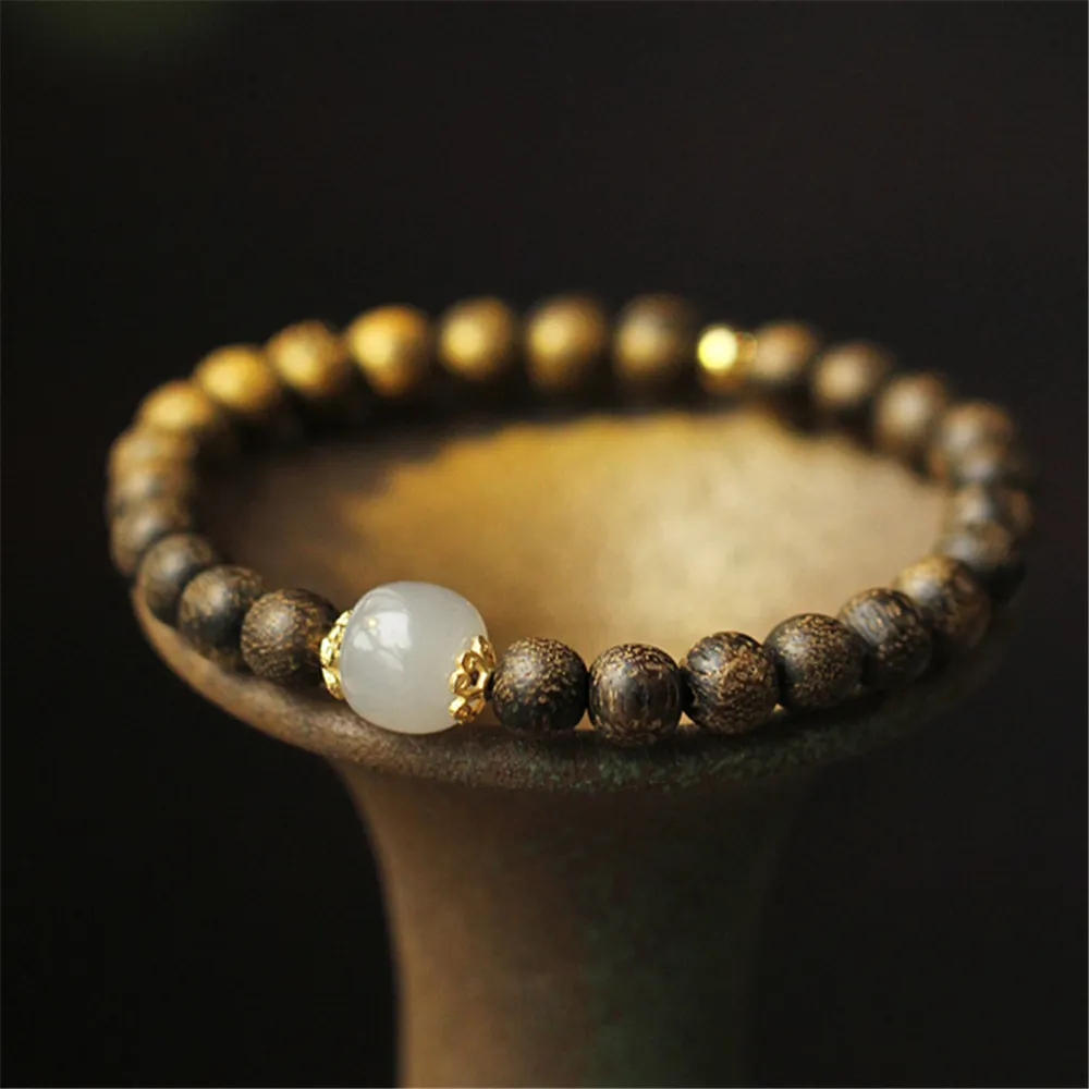 Side view of bracelet showing bead arrangement and proportional design for comfortable wear.