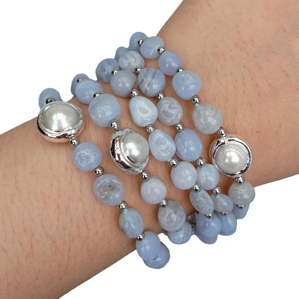 Women wearing blue lace agate cultured pearl bracelet displaying elegant classic style.
