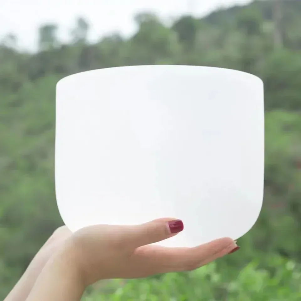 8 inch crystal singing bowl size comparison with hands showing perfect meditation bowl size.