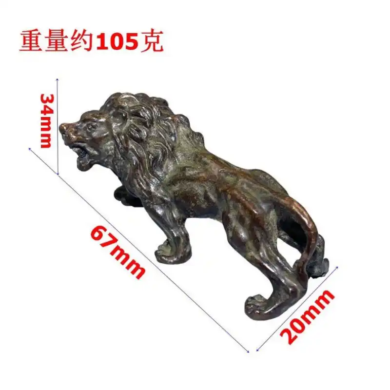 Bronze lion tea pet with tea ceremony accessories demonstrating functional and cultural use.