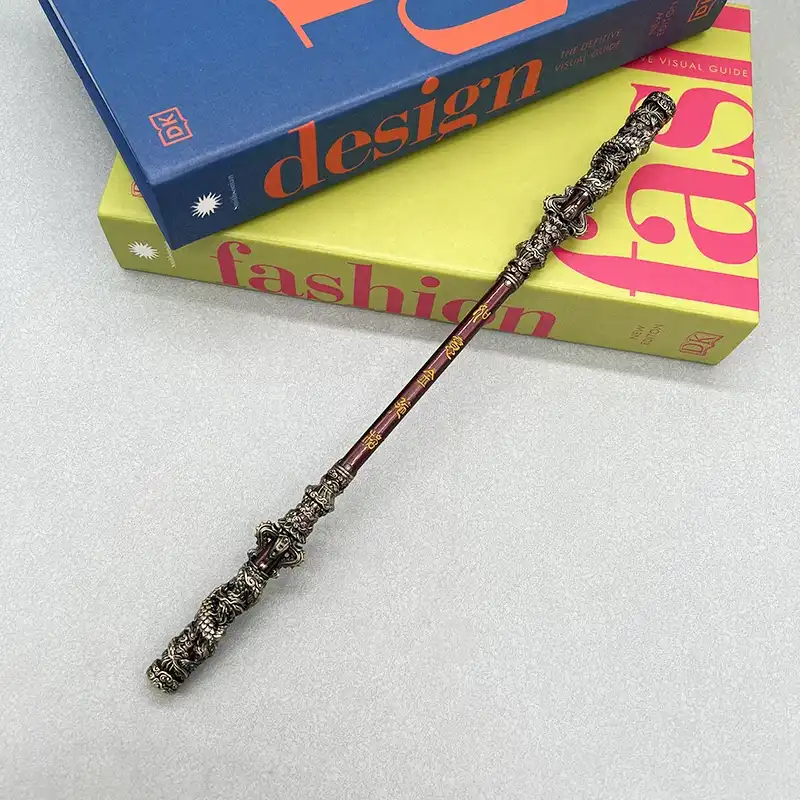 Multiple angle view of Ruyi Jingu Bang metal staff showing all design details