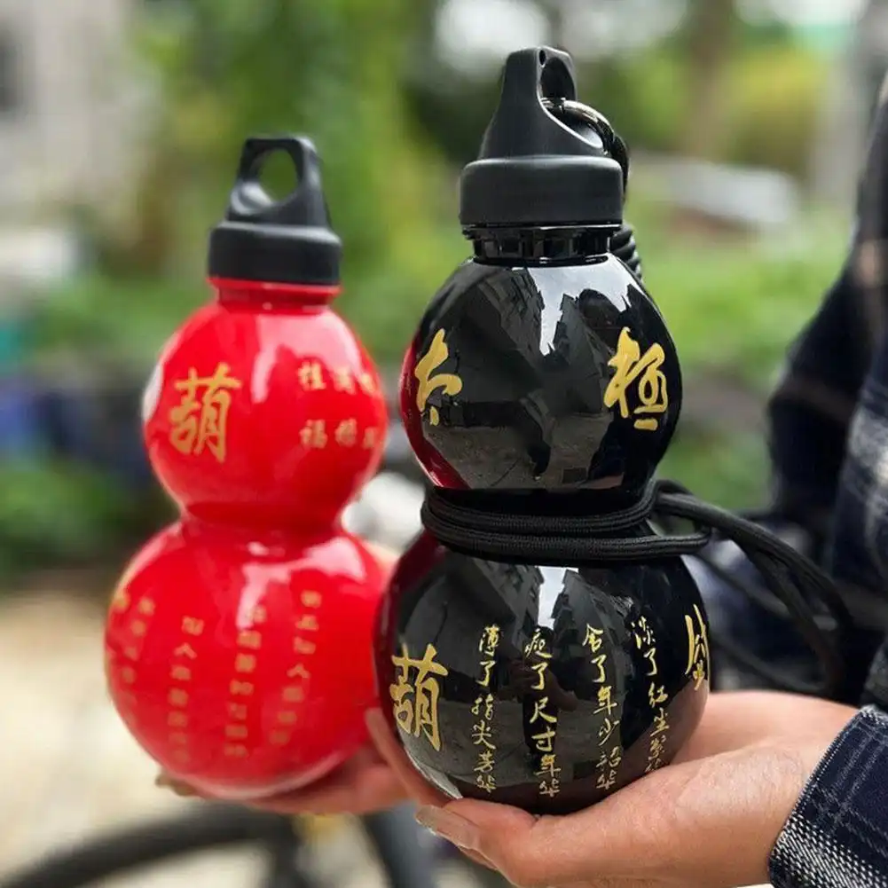 Gourd shaped water bottle being carried with shoulder strap for hands-free portable hydration.