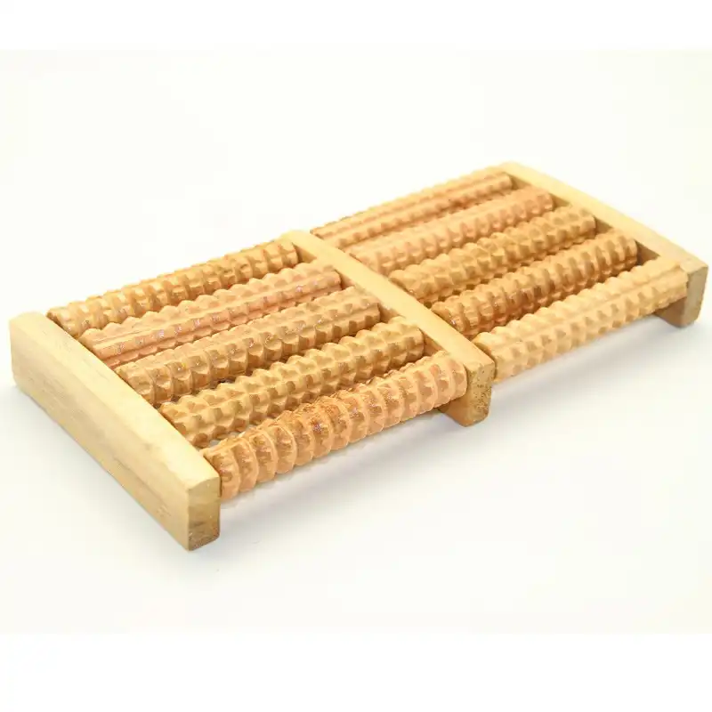 Wooden dual roller foot massager, side angle on white background..