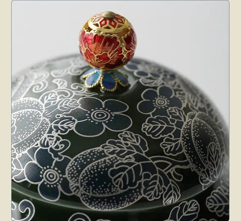 Butterfly love flower tea cups positioned for traditional Chinese kung fu tea ceremony ritual.