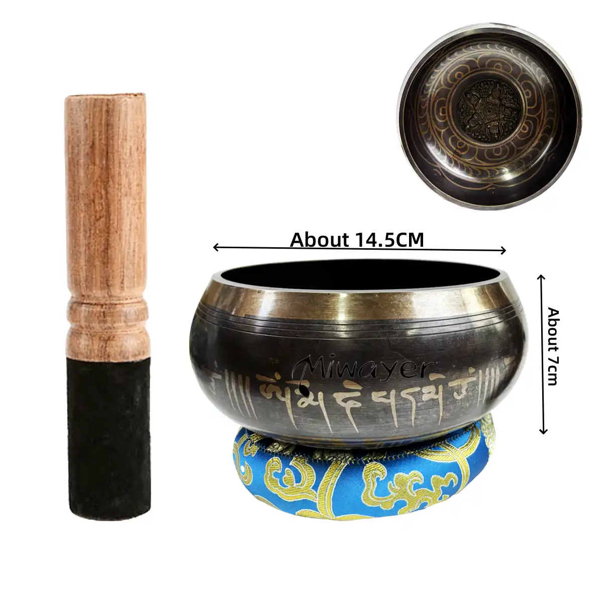 Peaceful home meditation space featuring singing bowl set on wooden table with plants.