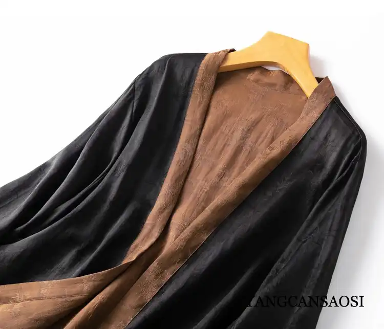 Gambiered silk jacket styled with office attire demonstrating versatile professional look.