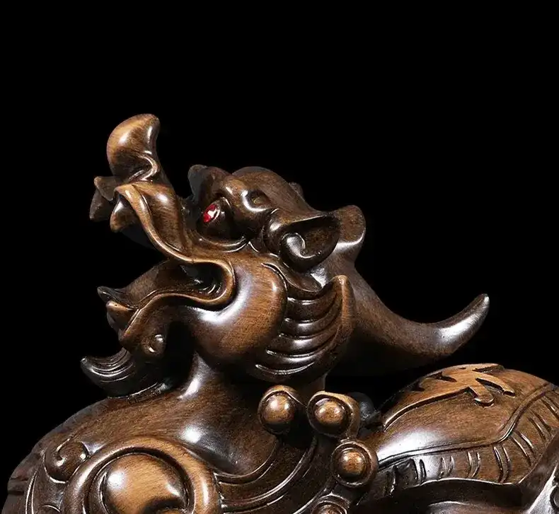 Lucky Money Pixiu statue in golden resin finish displaying traditional Chinese feng shui creature design.