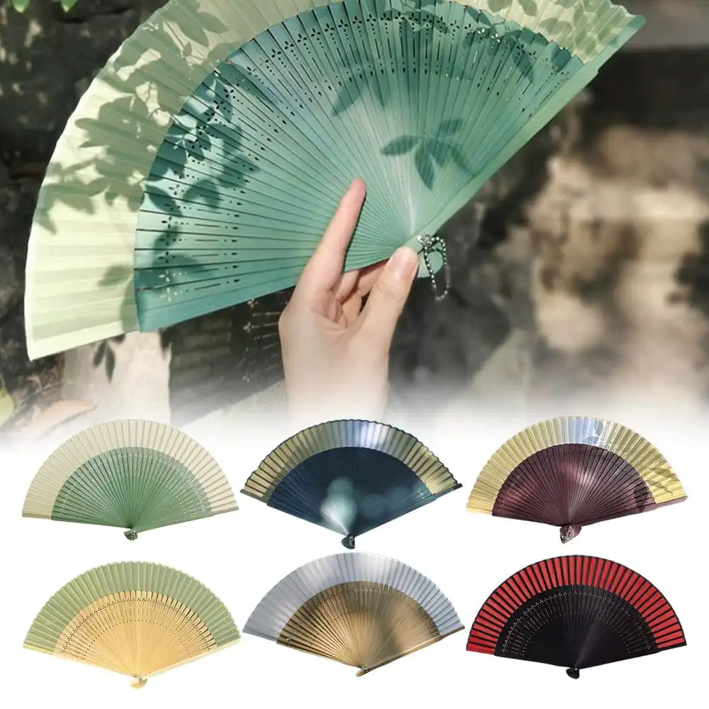 Lifestyle photography of elegant lady using Japanese folding fan for summer comfort.