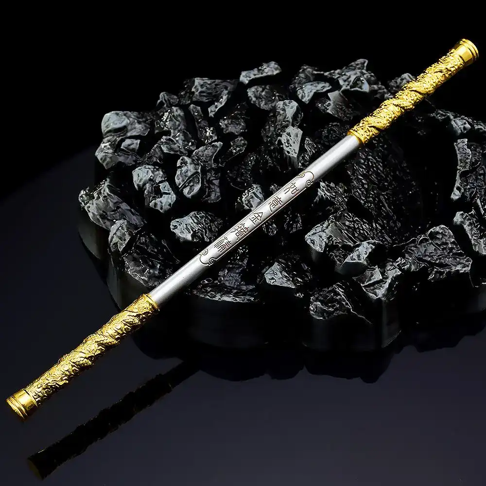 Sun Wukong staff replica displayed alongside other mythology collectibles in showcase setup.
