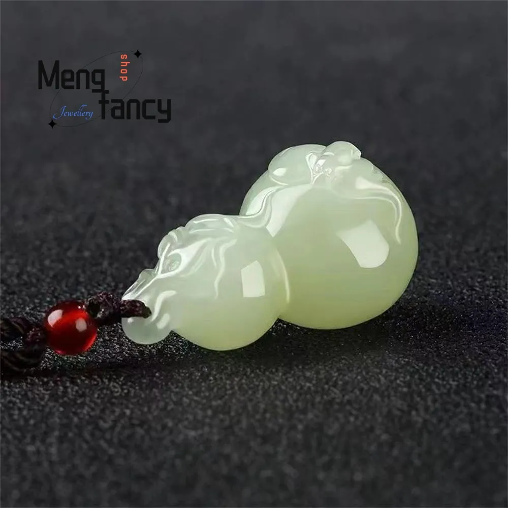 Hetian jade gourd pendant comparison with coin showing actual size and weight specifications.