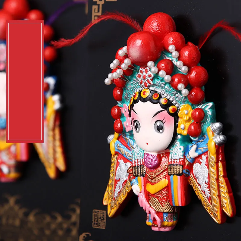 Christmas gift presentation of Chinese opera facial makeup ornament as cultural exchange present.