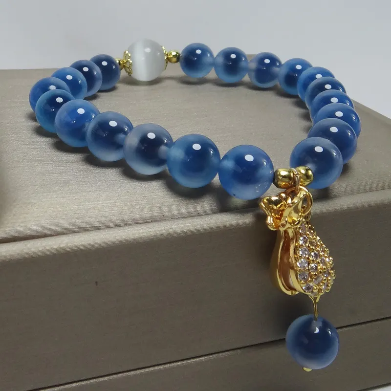 Natural blue agate bracelet packaging showing authentic crystal quality and handmade finish.