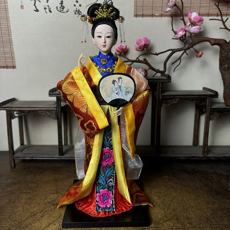 Cultural symbols and decorative elements on authentic Beijing opera doll ornament.