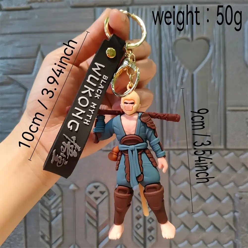 Black Myth Wukong car keychain attached to keys demonstrating practical everyday use and portable gaming accessory.