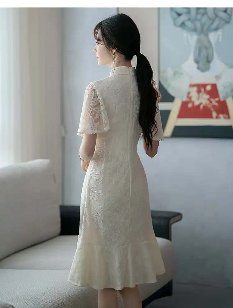 Chinese cheongsam stand collar dress styled for date night showing elegant appeal.