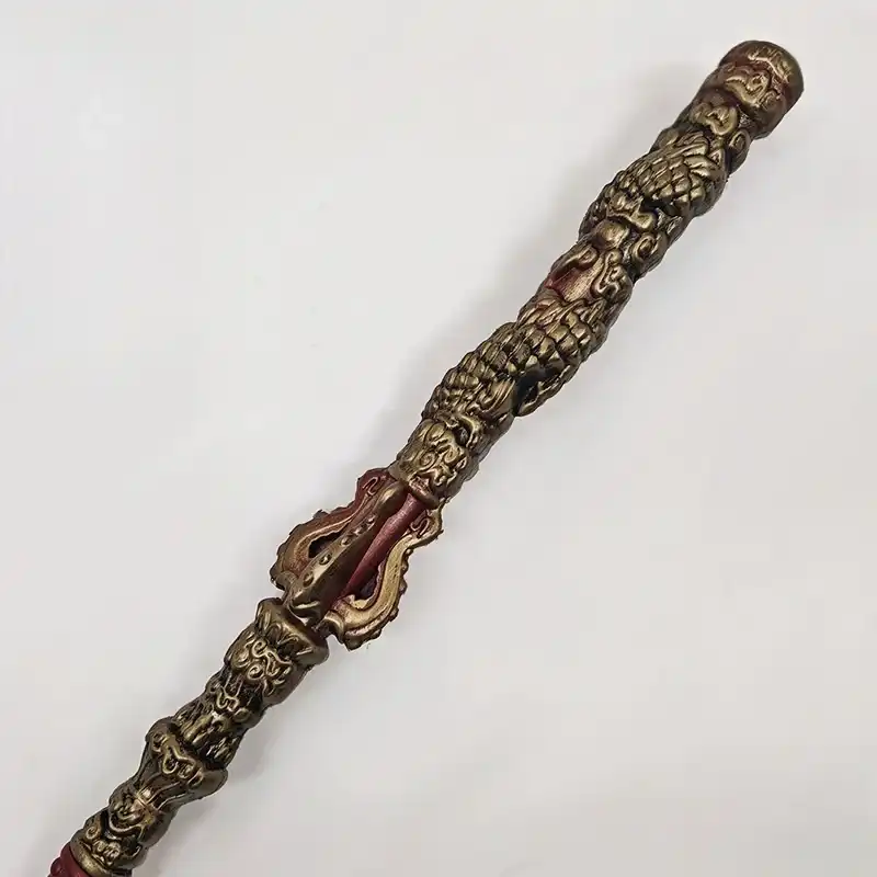 Premium packaging and presentation of full-size Sun Wukong weapon collectible merchandise.