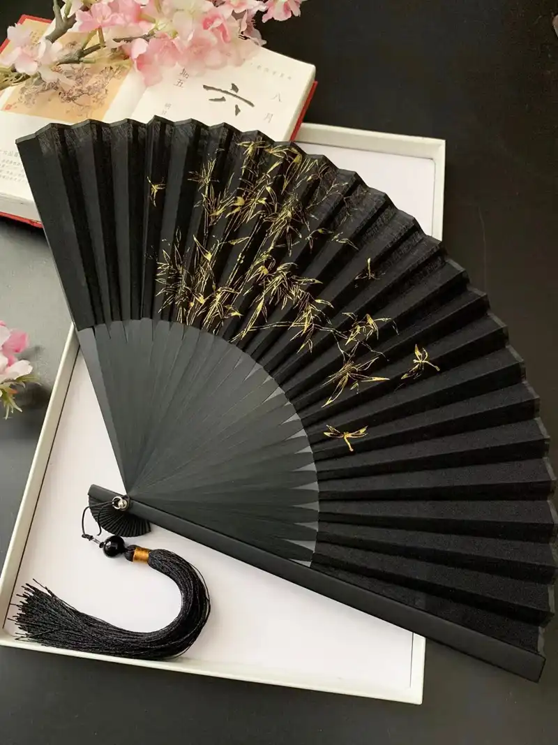 Classical costume styling featuring 8-inch bamboo folding fan as authentic accessory.