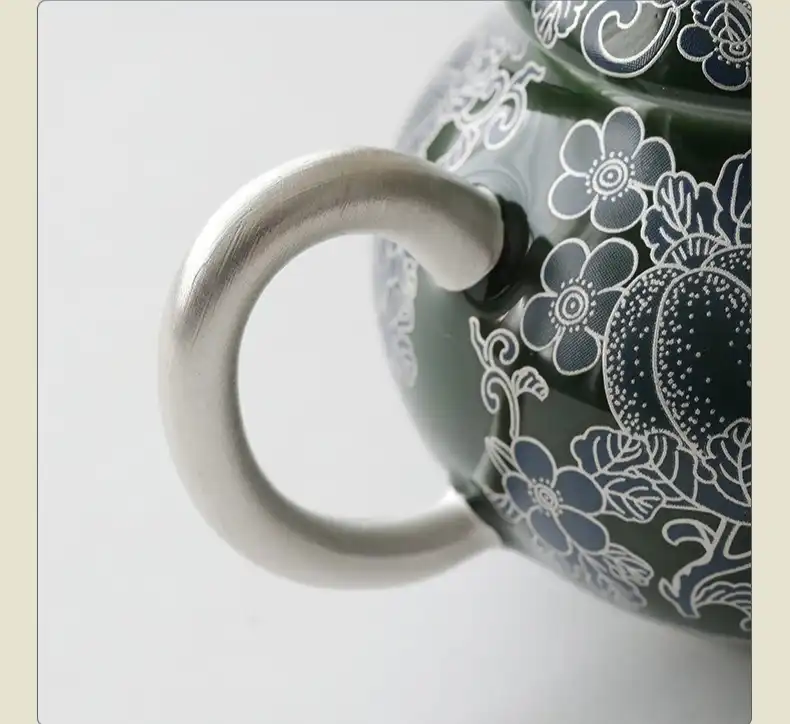 Traditional Chinese teaware featuring authentic butterfly cloisonne patterns and imperial styling.