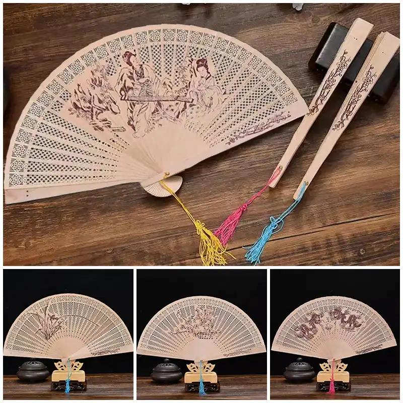 Chinese style wooden folding fan in home decor setting with traditional carved patterns.