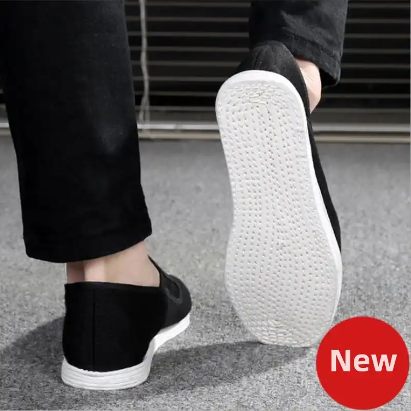 Top view of traditional Chinese martial arts shoes showing quality stitching and cotton fabric.