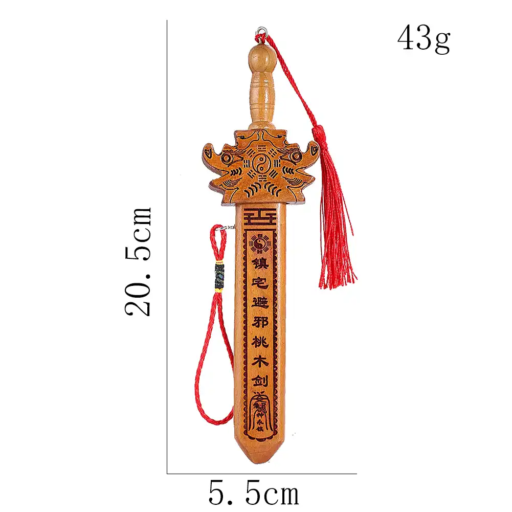 Peach wood sword displayed in home decor setting demonstrating feng shui placement and energy flow.
