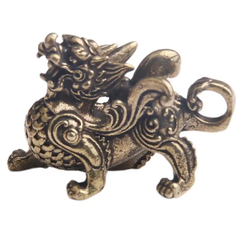 Brass Qilin figurine positioned in home setting demonstrating desktop decoration potential.